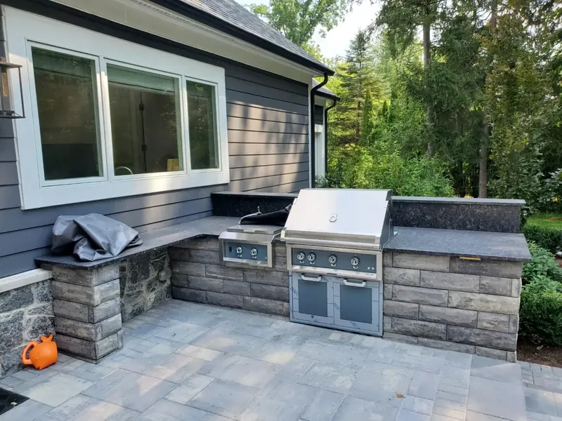 Outdoor kitchen with built-in grill